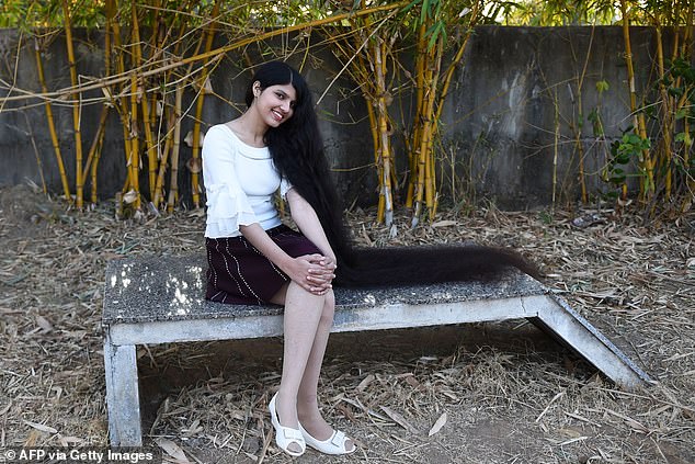 Her proud father said his only child's locks had turned her from a local celebrity into an international one